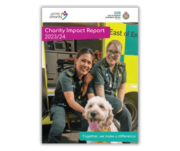 Impact report 23-24 front cover with EEAST staff with a GoodDOG