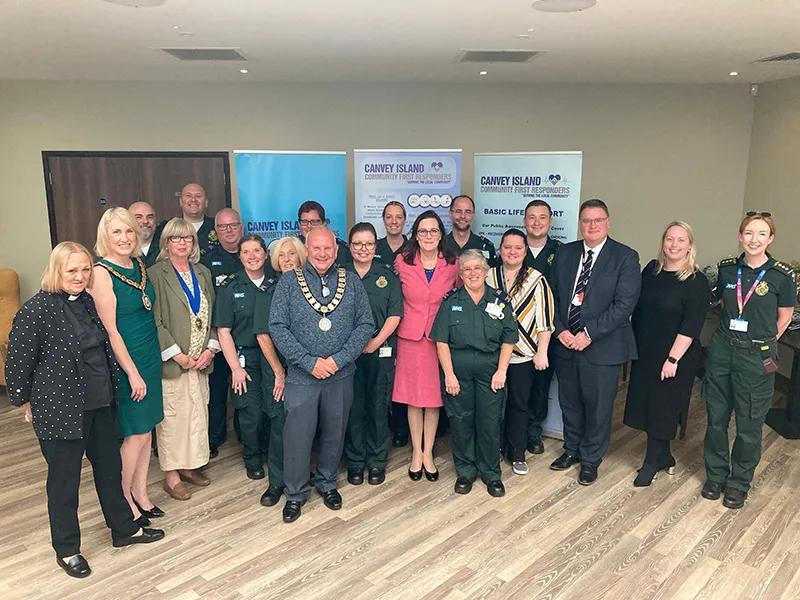 Dame Rebecca Harris MP with the Canvey Island CFRs and guests at the Fountain Bar in King's Park Village